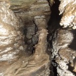 Peering Down the Upper Chamber at the Pilliar Icised by Erosion